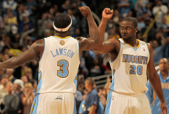 DENVER, CO - APRIL 25:  Ty Lawson #3 of the Denver Nuggets and Raymond Felton #20 of the Denver Nuggets celebrate late in the fourth quarter against the Oklahoma City Thunder in Game Four of the Western Conference Quarterfinals in the 2011 NBA Playoffs on April 24, 2011 at the Pepsi Center in Denver, Colorado. The Nuggets defeated the Thunder 104-101. NOTE TO USER: User expressly acknowledges and agrees that, by downloading and or using this photograph, User is consenting to the terms and conditions of the Getty Images License Agreement.  (Photo by Doug Pensinger/Getty Images)