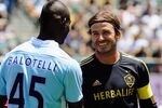 CARSON, CA - JULY 24:  David Beckham #23 of Los Angeles greets Mario Balotelli #45 of Manchester City  during the Herbalife World Football Challenge 2011 at the Home Depot Center on July 24, 2011 in Carson, California.  (Photo by Kevork Djansezian/Getty Images)