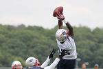 FOXBOROUGH, MA  - JULY 29:  Chad Ochocinco #85 of the New England Patriots catches a pass during the afternoon session of training camp at Gillette Stadium on July 29, 2011 in Foxborough, Massachusetts.  (Photo by Jim Rogash/Getty Images)