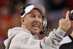 ARLINGTON, TX - DECEMBER 04:  Head coach Bo Pelini of the Nebraska Cornhuskers leads his team against the Oklahoma Sooners at Cowboys Stadium on December 4, 2010 in Arlington, Texas. The Sooners beat the Cornhuskers 23-20.  (Photo by Tom Pennington/Getty Images)
