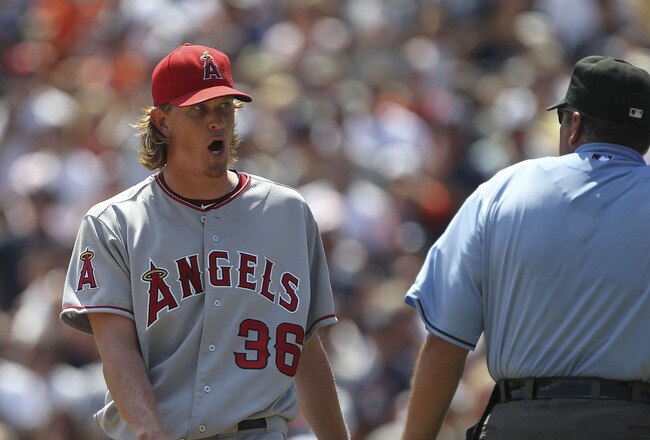 DETROIT - JULY 31:  Jered Weaver #36 of the Los Angeles Angels of Anaheim yells into the Tigers dugout after being throw out of the game by homeplate umpire Hunter Wendelstedt for throwing a pitch close to Alex Avila #13 of the   Detroit Tigers after Carlos Guillen #9 solo homerun to right field at Comerica Park on July 31, 2011 in Detroit, Michigan.  (Photo by Leon Halip/Getty Images)