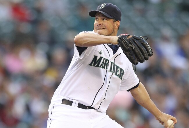 SEATTLE - JUNE 15:  Starting pitcher Erik Bedard #45 of the Seattle Mariners pitches against the Los Angeles Angels of Anaheim at Safeco Field on June 15, 2011 in Seattle, Washington. (Photo by Otto Greule Jr/Getty Images)