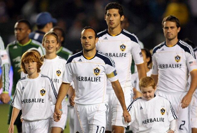 CARSON, CA - APRIL 23:  Landon Donovan #10 of the Los Angeles Galaxy leads his teammates to midfield prior to the MLS match against the Portland Timbers at The Home Depot Center on April 23, 2011 in Carson, California. The Galaxy defeated the Timbers 3-0.  (Photo by Victor Decolongon/Getty Images)