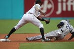 MIAMI GARDENS, FL - JULY 21:  Cameron Maybin #24 of the San Diego Padres slides into second base under the tag of Hanley Ramirez #2 of the Florida Marlins during a game at Sun Life Stadium on July 21, 2011 in Miami Gardens, Florida.  (Photo by Sarah Glenn/Getty Images)