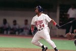 MINNEAPOLIS - OCTOBER 19:  Kirby Puckett #34 of the Minnesota Twins swings at a pitch during Game one of the 1991 World Series against the Atlanta Braves at the Metrodome on October 19, 1991 in Minneapolis, Minnesota. The Twins defeated the Braves 5-2.  (Photo by Rick Stewart/Getty Images)