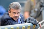 MINNEAPOLIS, MN - JUNE 27: Ned Colletti, General Manager of the Los Angeles Dodgers, watches batting practice before the game against the Minnesota Twins on June 27, 2011 at Target Field in Minneapolis, Minnesota. (Photo by Hannah Foslien/Getty Images)
