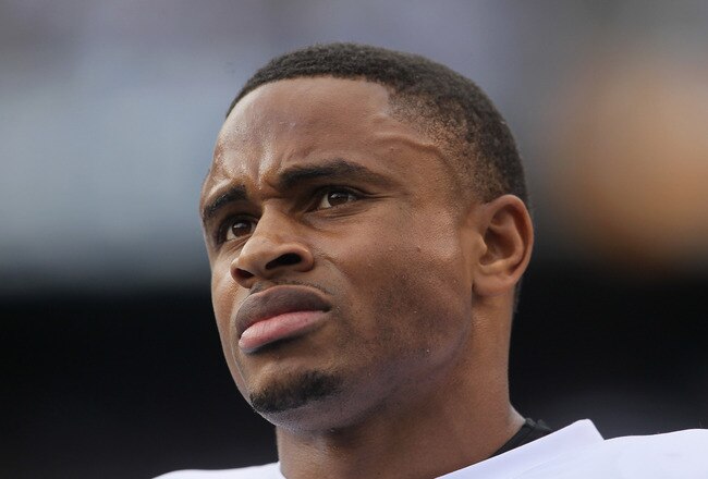 SAN DIEGO - DECEMBER 05:  Nnamdi Asomugha #21 the Oakland Raiders looks on from the sideline against the San Diego Chargers at Qualcomm Stadium on December 5, 2010 in San Diego, California. The Raiders defeated the Chargers 28-13.  (Photo by Jeff Gross/Getty Images)