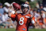 ENGLEWOOD, CO - JULY 28:  Quarterback Kyle Orton #8 of the Denver Broncos makes a pass during training camp at the Paul D. Bowlen Memorial Broncos Centre at Dove Valley on July 28, 2011 in Englewood, Colorado.  (Photo by Doug Pensinger/Getty Images)