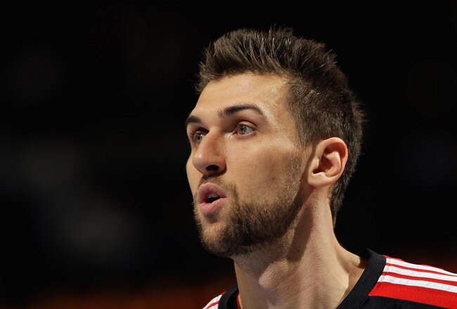 DENVER, CO - MARCH 21:  Andrea Bargnani #7 of the Toronto Raptors looks on during a break in the action against the Denver Nuggets at the Pepsi Center on March 21, 2011 in Denver, Colorado. The Nuggets defeated the Raptors 123-90. NOTE TO USER: User expressly acknowledges and agrees that, by downloading and or using this photograph, User is consenting to the terms and conditions of the Getty Images License Agreement.  (Photo by Doug Pensinger/Getty Images)