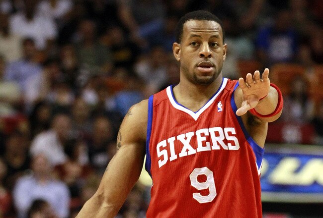 MIAMI, FL - MARCH 25:  Guard Andr Iguodala #9 of the Philadelphia Sixers brings up the ball against the Miami Heat at American Airlines Arena on March 25, 2011 in Miami, Florida. The Heat defeated the Sixers 111-99. NOTE TO USER: User expressly acknowledges and agrees that, by downloading and/or using this Photograph, User is consenting to the terms and conditions of the Getty Images License Agreement.  (Photo by Marc Serota/Getty Images)
