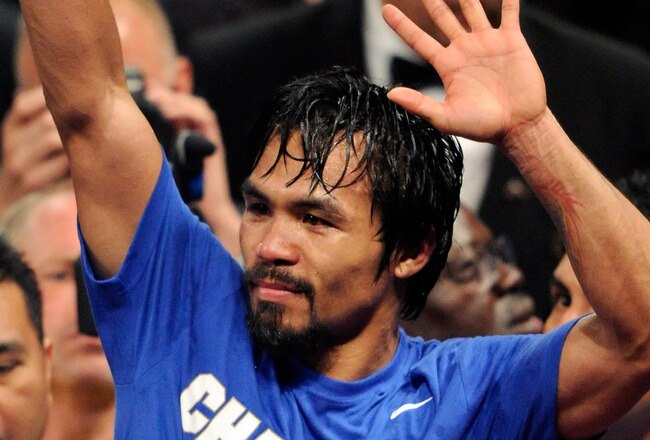 LAS VEGAS, NV - MAY 07:  Boxer Manny Pacquiao reacts at the end of his WBO welterweight title fight against Shane Mosley at the MGM Grand Garden Arena May 7, 2011 in Las Vegas, Nevada. Pacquiao retained his title by unanimous decision.  (Photo by Ethan Miller/Getty Images)