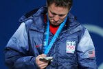 VANCOUVER, BC - FEBRUARY 26:  Jeret Peterson of the United States celebrates winning the silver medal during the medal ceremony for the men�s freestyle skiing aerials on day 15 of the Vancouver 2010 Winter Olympics at BC Place on February 26, 2010 in Vancouver, Canada.  (Photo by Kevork Djansezian/Getty Images)