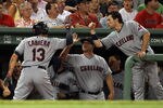 BOSTON, MA - AUGUST 01:  Asdrubal Cabrera #13 of the Cleveland Indians is congratulated by teammates in the dugout after his two run homer in the sixth inning against the Boston Red Sox on August 1, 2011 at Fenway Park in Boston, Massachusetts.  (Photo by Elsa/Getty Images)