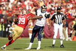 SAN FRANCISCO - NOVEMBER 14:  Sam Bradford #8  of the St. Louis Rams is hit by Manny Lawson #99 of the San Francisco 49ers at Candlestick Park on November 14, 2010 in San Francisco, California.  (Photo by Ezra Shaw/Getty Images)