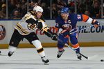UNIONDALE, NY - MARCH 06: Marc Savard #91 of the Boston Bruins skates against the New York Islanders at the Nassau Coliseum on March 6, 2010 in Uniondale, New York.  (Photo by Bruce Bennett/Getty Images)