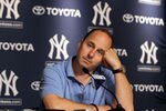 NEW YORK, NY - JULY 08:  General manager Brian Cashman of the New York Yankees speaks to the media after the game against the Tampa Bay Rays was postponed due to rain on July 8, 2011 at Yankee Stadium in the Bronx borough of New York City.  (Photo by Jim McIsaac/Getty Images)