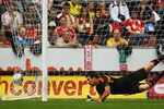 HULL, ENGLAND - JULY 23:  Doni of Liverpool is beaten by the shot from Robert Koren of Hull City during the Pre Season Friendly match between Hull City and Liverpool at KC Stadium on July 23, 2011 in Hull, England.  (Photo by Matthew Lewis/Getty Images)