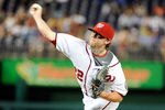 WASHINGTON, DC - AUGUST 01:  Drew Storen #22 of the Washington Nationals pitches against the Atlanta Braves at Nationals Park on August 1, 2011 in Washington, DC. The Nationals won the game 5-3. (Photo by Greg Fiume/Getty Images)