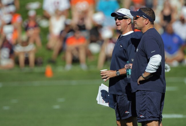 ENGLEWOOD, CO - JULY 28:  (L-R) Head coach John Fox of the Denver Broncos and Brian Xanders, General Manager, watch the team during training camp at the Paul D. Bowlen Memorial Broncos Centre at Dove Valley on July 28, 2011 in Englewood, Colorado.  (Photo by Doug Pensinger/Getty Images)