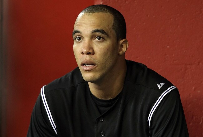 PHOENIX, AZ - JULY 24:  Starting pitcher Ubaldo Jimenez #38 of the Colorado Rockies watches from the dugout during the Major League Baseball game against the Arizona Diamondbacks at Chase Field on July 24, 2011 in Phoenix, Arizona.  (Photo by Christian Petersen/Getty Images)