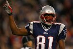 FOXBORO, MA - DECEMBER 23:  Randy Moss # 81 of the New England Patriots  scores a touchdown in the first quarter against the Miami Dolphins at Gillette Stadium on December 23, 2007 in Foxboro, Massachusetts. (Photo by Jim Rogash/Getty Images)