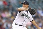 SEATTLE - JUNE 15:  Starting pitcher Erik Bedard #45 of the Seattle Mariners pitches against the Los Angeles Angels of Anaheim at Safeco Field on June 15, 2011 in Seattle, Washington. (Photo by Otto Greule Jr/Getty Images)
