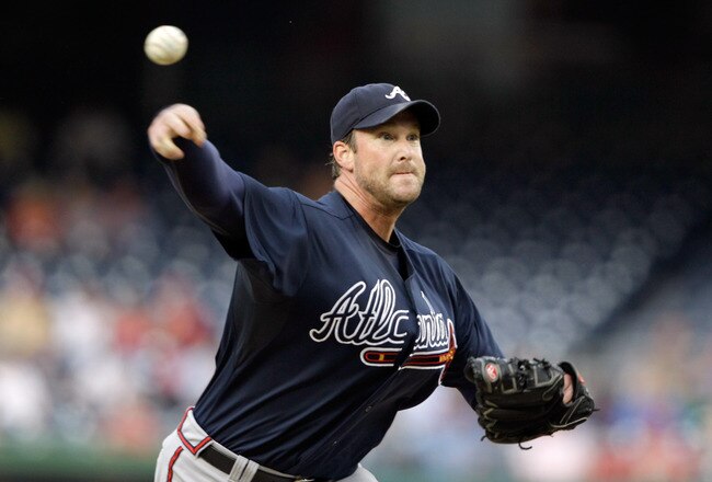 WASHINGTON, DC - AUGUST 02: Starting pitcher Derek Lowe #32 of the Atlanta Braves throws to a Washington Nationals batter during the first inning at Nationals Park on August 2, 2011 in Washington, DC.  (Photo by Rob Carr/Getty Images)