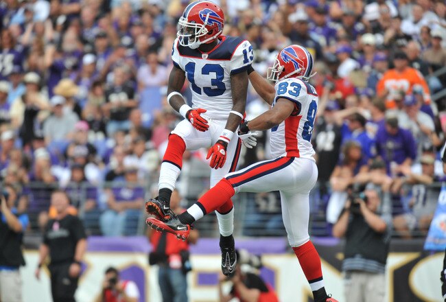 BALTIMORE, MD - OCTOBER 24:  Steve Johnson #13 and Lee Evans #83 of the Buffalo Bills celebrate Lee's touchdown against the Baltimore Ravens at M&T Bank Stadium on October 24, 2010 in Baltimore, Maryland. The Ravens defeated the Bills 37-34. (Photo by Larry French/Getty Images)