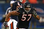 CHICAGO - SEPTEMBER 20: Olin Kreutz #57 of the Chicago Bears moves to block for teammate Jay Cutler #6 against the Pittsburgh Steelers on September 20, 2009 at Soldier Field in Chicago, Illinois. The Bears defeated the Steelers 17-14. (Photo by Jonathan Daniel/Getty Images)
