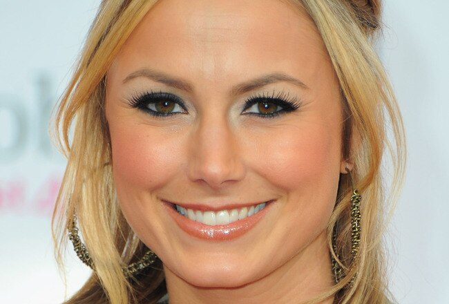LOS ANGELES, CA - FEBRUARY 20:  Actress Stacey Keibler arrives to the T-Mobile Magenta Carpet at the 2011 NBA All-Star Game on February 20, 2011 in Los Angeles, California.  (Photo by Alberto E. Rodriguez/Getty Images)