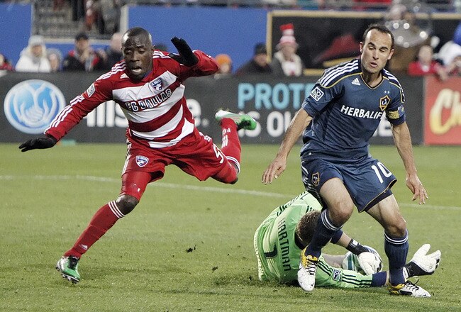 FRISCO, TX - MAY 1: Landon Donovan #10 of the Los Angeles Galaxy attempts a shot on goal as goal keeper Kevin Hartman #1 and Jair Benitez #5 of FC Dallas defend during the first half of a soccer game at Pizza Hut Park on May 1, 2011 in Frisco, Texas. FC Dallas won 2-1.  (Photo by Brandon Wade/Getty Images)