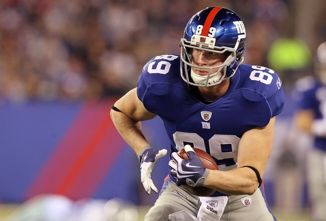 EAST RUTHERFORD, NJ - NOVEMBER 14:  Kevin Boss #89 of the New York Giants runs against the Dallas Cowboys on November 14, 2010 at the New Meadowlands Stadium in East Rutherford, New Jersey. The Cowboys defeated the Giants 33-20.  (Photo by Jim McIsaac/Getty Images)