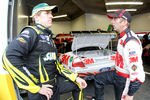 DAYTONA BEACH, FL - JUNE 30:  (L-R) Carl Edwards, driver of the #99 SUBWAY Ford, talks with teammate Greg Biffle, driver of the #16 3M Ford, during practice for the NASCAR Sprint Cup Series COKE ZERO 400 Powered by Coca-Cola at Daytona International Speedway on June 30, 2011 in Daytona Beach, Florida.  (Photo by Todd Warshaw/Getty Images for NASCAR)
