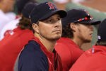 BOSTON, MA - AUGUST 2:   Erik Bedard #23 of the Boston Red Sox watches the action from the dugout against the Cleveland Indians at Fenway Park on August 2, 2011 in Boston, Massachusetts. The game was delayed because of rain storms. (Photo by Jim Rogash/Getty Images)
