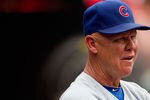 ST. LOUIS, MO - JULY 30: Manager Mike Quade #8 of the Chicago Cubs looks on from the dugout against the St. Louis Cardinals at Busch Stadium on July 30, 2011 in St. Louis, Missouri.  (Photo by Dilip Vishwanat/Getty Images)