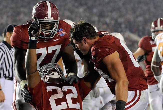 PASADENA, CA - JANUARY 07:  Running back Mark Ingram #22 of the Alabama Crimson Tide celebrates with teammates after scoring in the fourth quarter against the Texas Longhorns during the Citi BCS National Championship game at the Rose Bowl on January 7, 2010 in Pasadena, California.  (Photo by Kevork Djansezian/Getty Images)