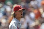 DETROIT - JULY 31:  Jered Weaver #36 of the Los Angeles Angels of Anaheim yells into the Tigers dugout after being throw out of the game by homeplate umpire Hunter Wendelstedt for throwing a pitch close to Alex Avila #13 of the   Detroit Tigers after Carlos Guillen #9 solo homerun to right field at Comerica Park on July 31, 2011 in Detroit, Michigan.  (Photo by Leon Halip/Getty Images)