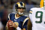 ST. LOUIS, MO - SEPTEMBER 27: Marc Bulger #10 of the St. Louis Rams looks to pass the Green Bay Packers at the Edward Jones Dome on September 27, 2009 in St. Louis, Missouri.  (Photo by Dilip Vishwanat/Getty Images)