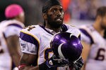 EAST RUTHERFORD, NJ - OCTOBER 11:  Randy Moss #84 of the Minnesota Vikings looks on against the New York Jets at New Meadowlands Stadium on October 11, 2010 in East Rutherford, New Jersey. The Jets won 29-20.  (Photo by Jim McIsaac/Getty Images)
