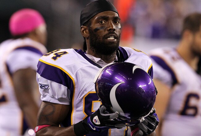EAST RUTHERFORD, NJ - OCTOBER 11:  Randy Moss #84 of the Minnesota Vikings looks on against the New York Jets at New Meadowlands Stadium on October 11, 2010 in East Rutherford, New Jersey. The Jets won 29-20.  (Photo by Jim McIsaac/Getty Images)