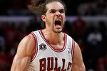 CHICAGO, IL - MAY 15:  Joakim Noah #13 of the Chicago Bulls reacts against the Miami Heat in Game One of the Eastern Conference Finals during the 2011 NBA Playoffs on May 15, 2011 at the United Center in Chicago, Illinois. NOTE TO USER: User expressly acknowledges and agrees that, by downloading and or using this photograph, User is consenting to the terms and conditions of the Getty Images License Agreement  (Photo by Gregory Shamus/Getty Images)