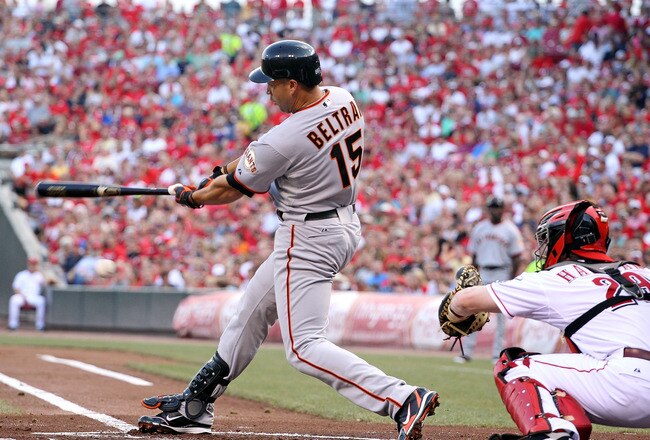 CINCINNATI, OH - JULY 30:  Carlos Beltran #15 of the San Francisco swings at a pitch during the game against the Cincinnati Reds at Great American Ball Park on July 30, 2011 in Cincinnati, Ohio.  (Photo by Andy Lyons/Getty Images)