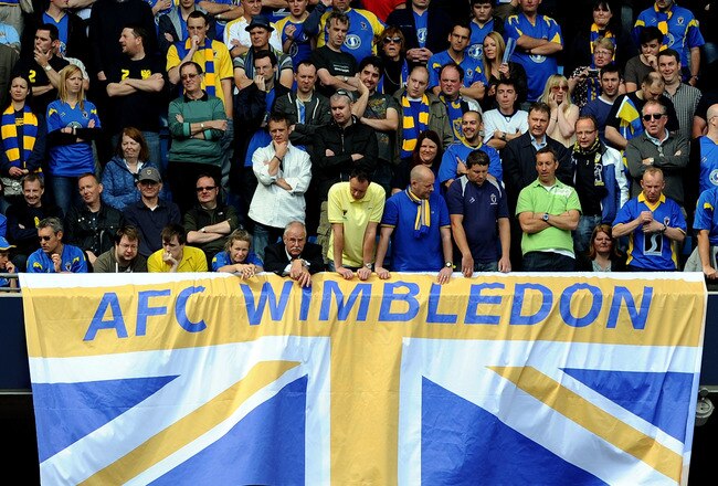 MANCHESTER, ENGLAND - MAY 21:  AFC Wimbledon fans look on during the Blue Square Bet Premier League Play Off Final between AFC Wimbledon and Luton Town at City of Manchester Stadium on May 21, 2011 in Manchester, England.  (Photo by Chris Brunskill/Getty Images)