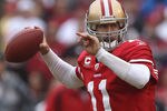 SAN FRANCISCO - DECEMBER 12:    Alex Smith #11 of the San Francisco 49ers passes against the Seattle Seahawks during an NFL game at Candlestick Park on December 12, 2010 in San Francisco, California.  (Photo by Jed Jacobsohn/Getty Images)