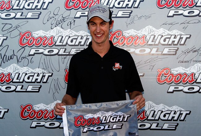 SONOMA, CA - JUNE 24:  Joey Logano, driver of the #20 The Home Depot Toyota, celebrates setting the pole position during qualifying for the NASCAR Sprint Cup Series Toyota/Save Mart 350 at Infineon Raceway on June 24, 2011 in Sonoma, California.  (Photo by Tom Pennington/Getty Images)