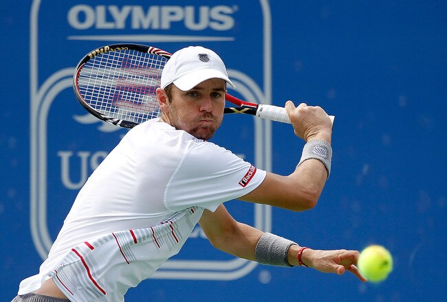 NORCROSS, GA - JULY 24:  Mardy Fish plays a backhand during the singles final against John Isner at the Atlanta Tennis Championships at the Racquet Club of the South on July 24, 2011 in Norcross, Georgia.  (Photo by Mike Ehrmann/Getty Images)