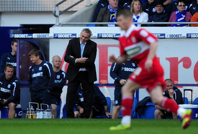 CARDIFF, WALES - MAY 02:  Cardiff manager Dave Jones and his bench react during the npower Championship game between Cardiff City and Middlesbrough at Cardiff City Stadium on May 2, 2011 in Cardiff, Wales.  (Photo by Stu Forster/Getty Images)