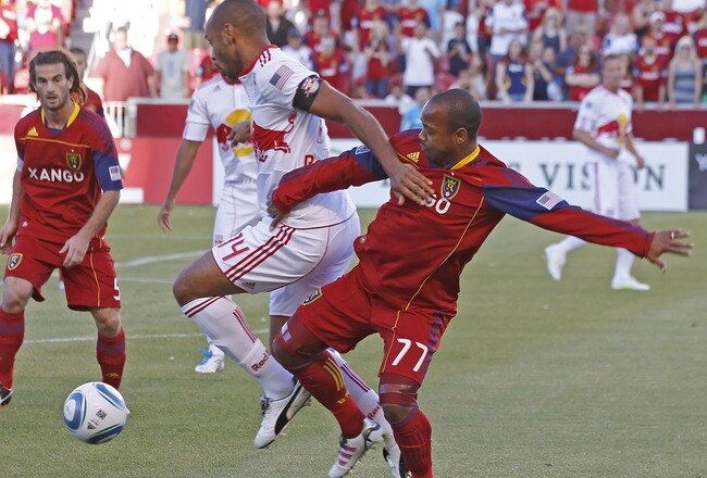 SANDY, UT - AUGUST 6: Andy Williams #77 of Real Salt Lake and Thierry Henry #14 of the New York Red Bulls fights for the ball during the first half of an MLS soccer game August 6, 2011 at Rio Tinto Stadium in Sandy, Utah. (Photo by George Frey/Getty Images)