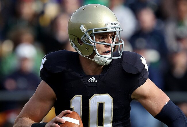 SOUTH BEND, IN - OCTOBER 30: Dayne Crist #10 of the Notre Dame Fighting Irish looks for a receiver against the Tulsa Golden Hurricane at Notre Dame Stadium on October 30, 2010 in South Bend, Indiana. Tulsa defeated Notre Dame 28-27. (Photo by Jonathan Daniel/Getty Images)