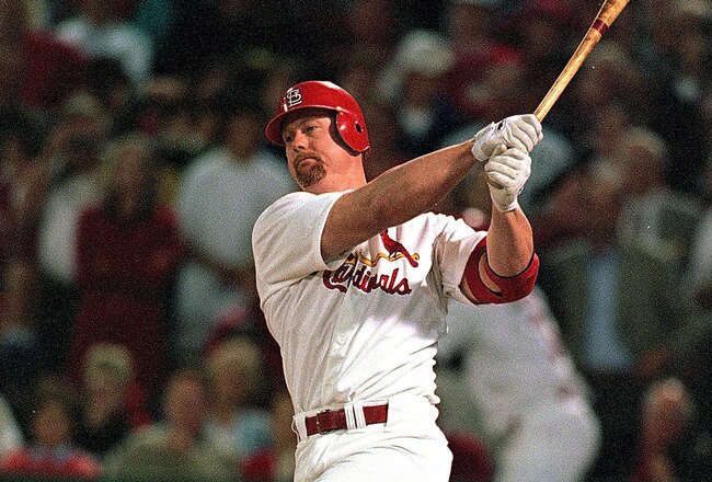 23 Sep 1998: (FILE PHOTO)  Mark McGwire #25 of the St. Louis Cardinals hits the ball during the game against the Houston Astros at Busch Stadium in St. Louis, Missouri. According to reports January 11, 2010, McGwire has admitted to steroid use during while playing Major League baseball and when he broke the home run record.  (Photo by Jonathan Daniel/Getty Images)